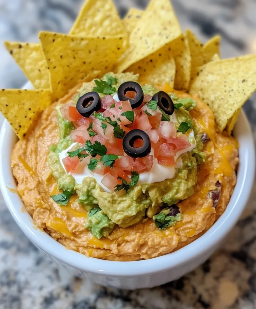 12 College Football Kickoff Dips for Game-Day Snacking 2 5-Layer Mexican Dip or Nachos Supreme